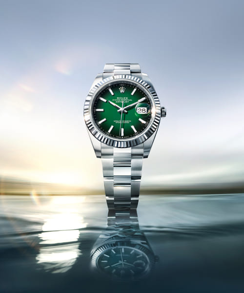 Image of the new Rolex Datejust 41 Reference 126334 pictured on top of water with relection 